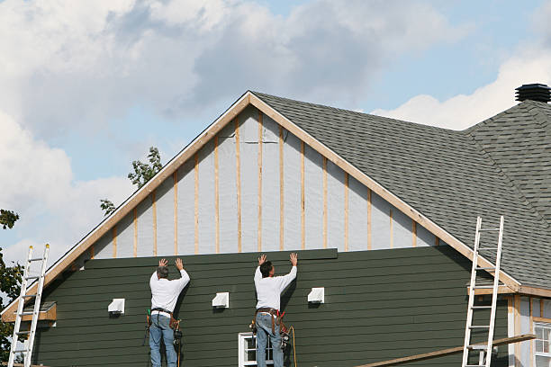 Professional Siding technician working in Cockeysville, MD